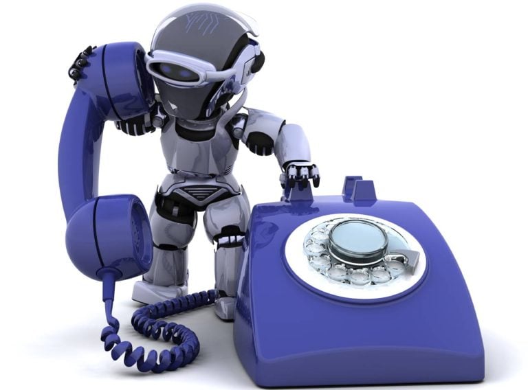 a robot holding a telephone